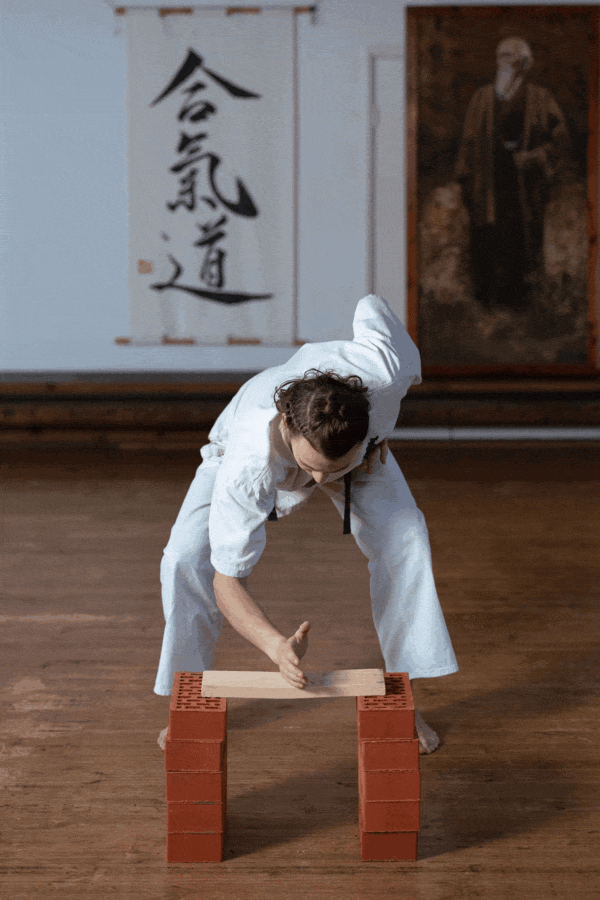 breaking boards with a karate chop