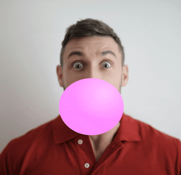 man blowing a bubble-gum bubble